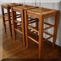 F23. Set of 3 rush seat counter height stools. 26&rdquo;h 